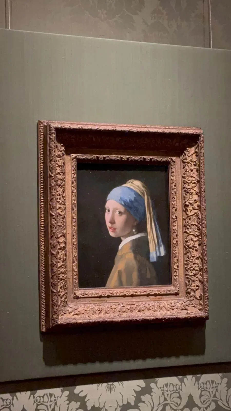 Girl with a Pearl Earring in its frame at the Mauritshuis