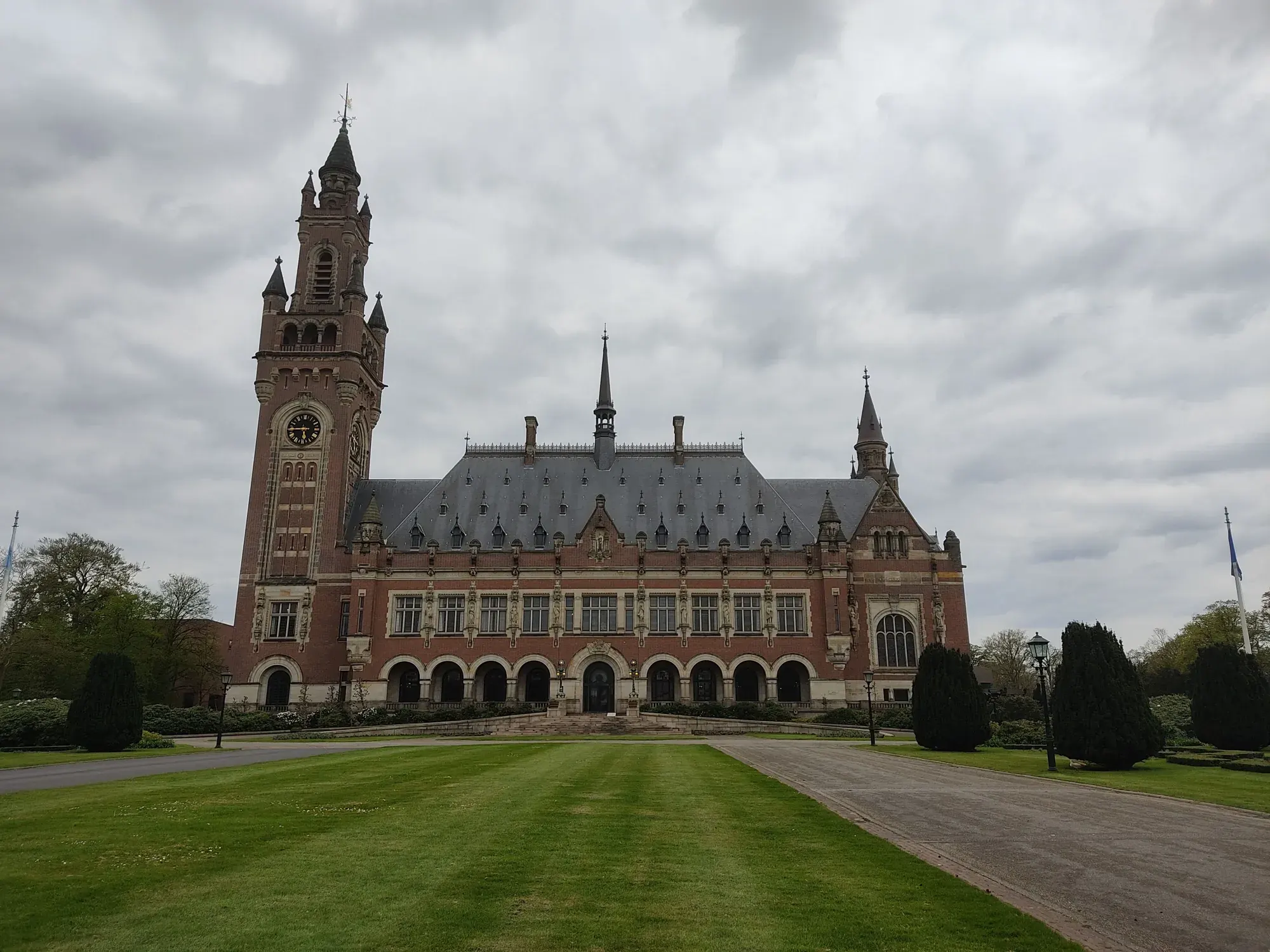 The Peace Palace in The Hague, seen across the front lawn from the Carnegieplein gate