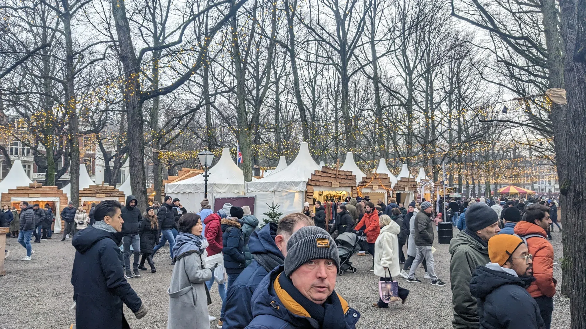 Wooden chalets of the Royal Christmas Fair under the trees of the Lange Voorhout in The Hague