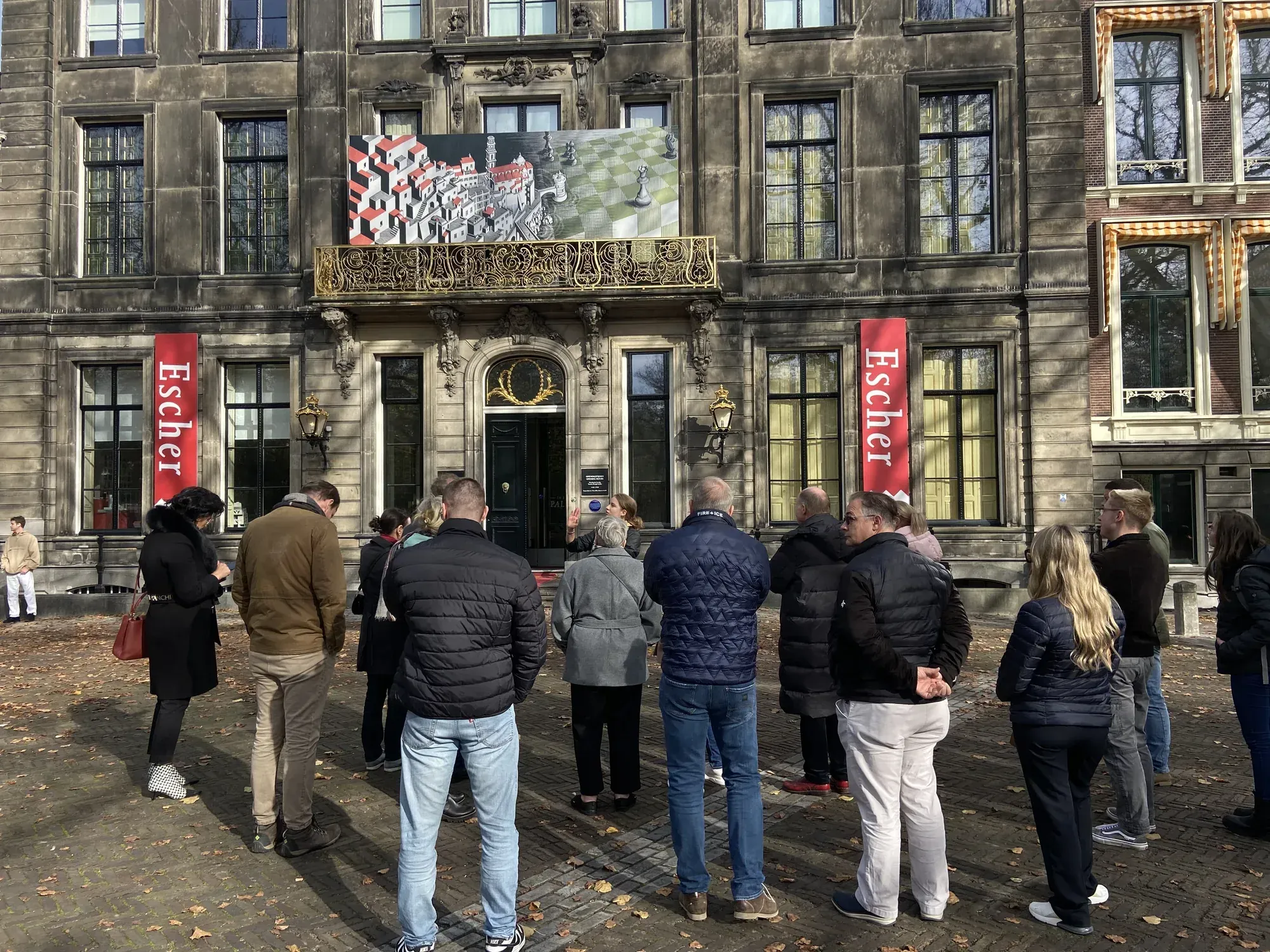 A Discover The Hague tour group inside Escher in Het Paleis on the Lange Voorhout